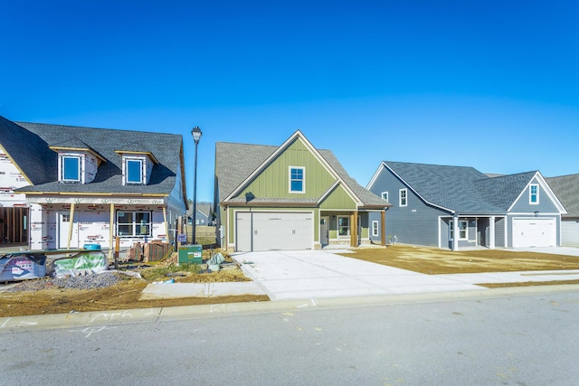 view of front of home with a garage and covered porch