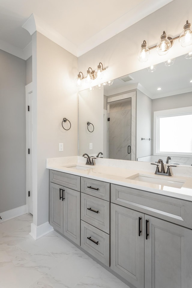 bathroom featuring ornamental molding, vanity, and a shower with shower door