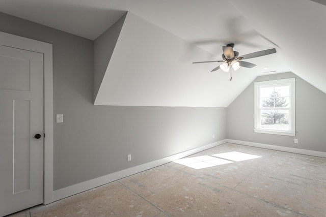 bonus room with lofted ceiling and ceiling fan