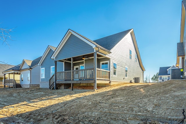 view of front of property featuring central AC unit and covered porch