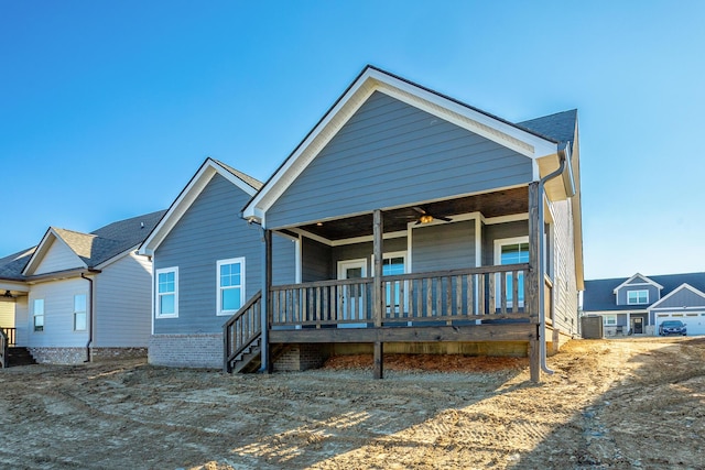 view of front of home featuring central AC unit and a porch