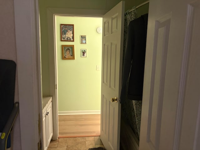 bathroom featuring hardwood / wood-style floors, vanity, and a shower with curtain