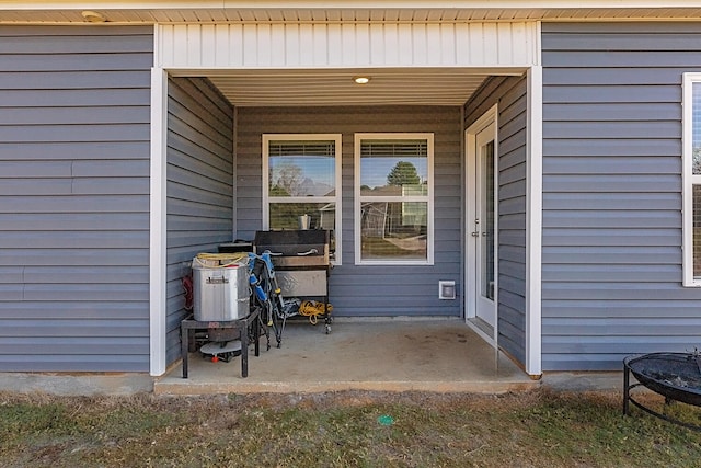 doorway to property featuring a patio