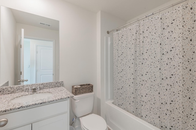 full bathroom featuring vanity, toilet, and shower / bath combo with shower curtain