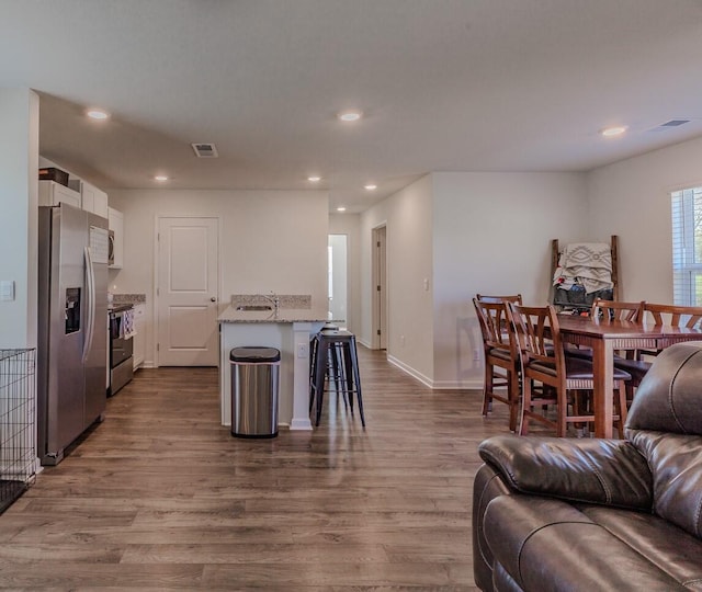 living room with hardwood / wood-style floors