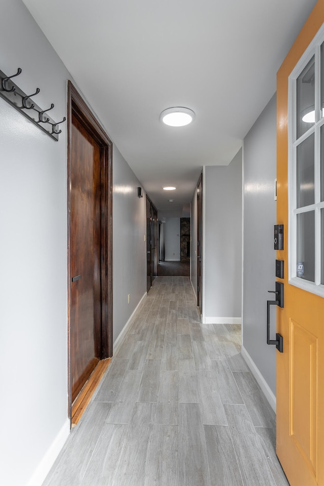 hallway featuring light hardwood / wood-style floors