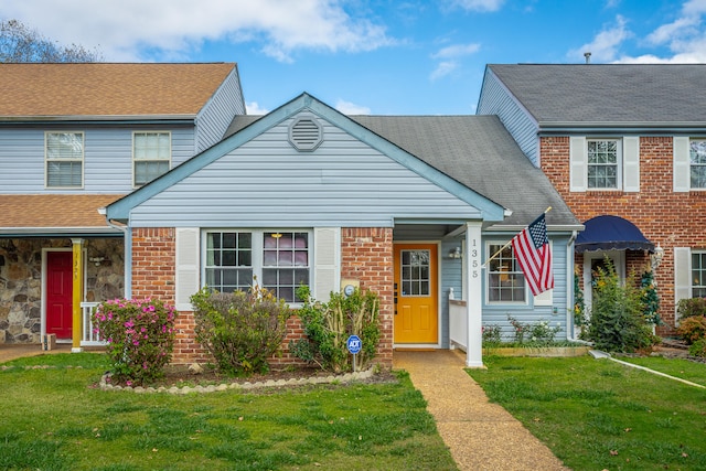 view of front of property with a front lawn