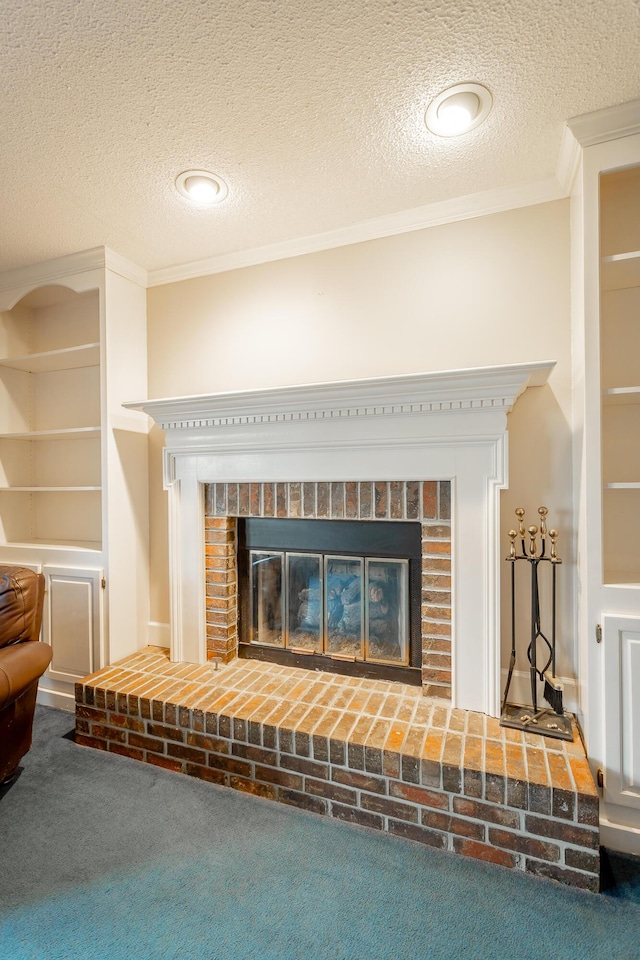 room details featuring crown molding, a fireplace, a textured ceiling, and carpet