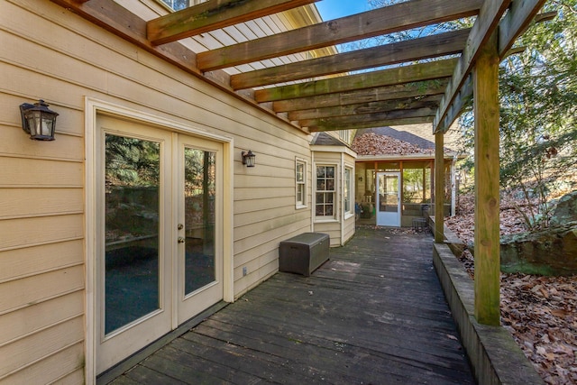 wooden terrace with a sunroom