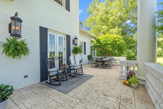 view of patio featuring french doors