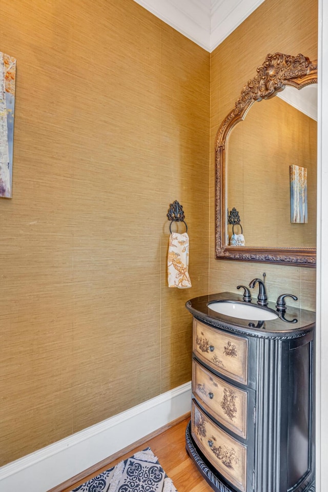 bathroom featuring hardwood / wood-style floors and vanity