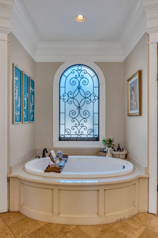 bathroom featuring a tub to relax in, tile patterned floors, and crown molding