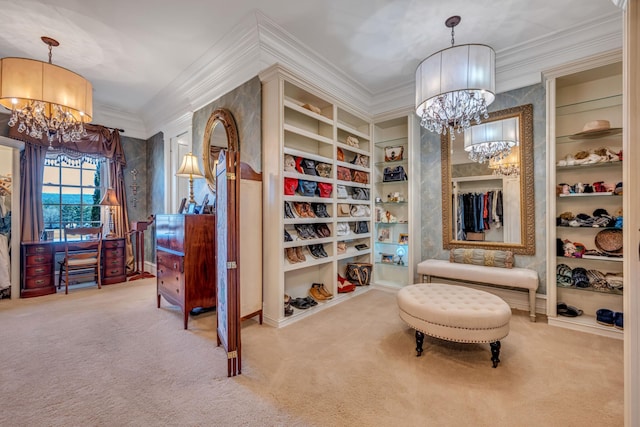 walk in closet with light carpet and an inviting chandelier