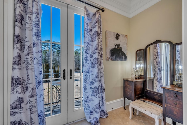 interior space featuring crown molding, tile patterned floors, and french doors