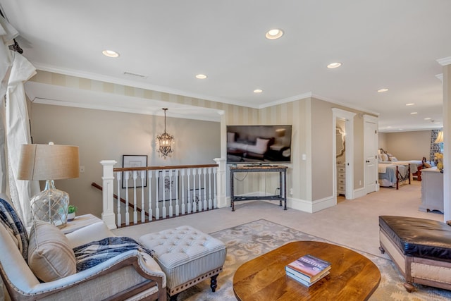 living room featuring carpet flooring, ornamental molding, and an inviting chandelier