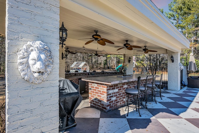 view of patio featuring a bar