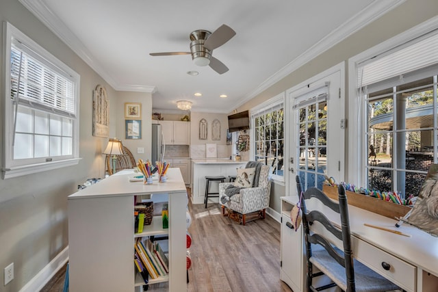 dining area with ceiling fan, light hardwood / wood-style flooring, french doors, and ornamental molding