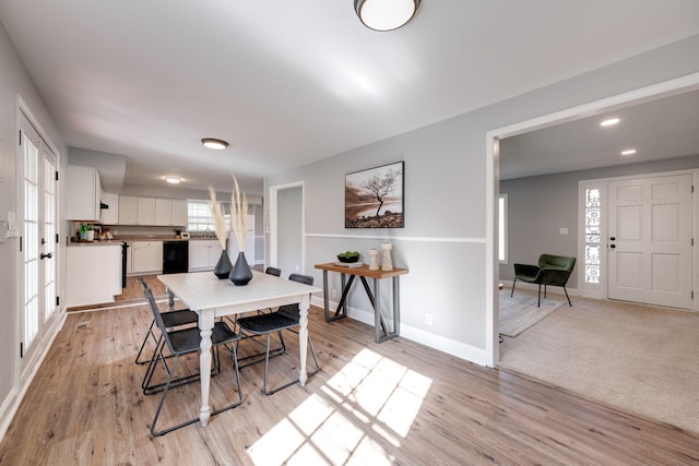 dining space featuring light hardwood / wood-style flooring