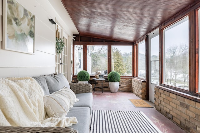 sunroom / solarium featuring vaulted ceiling and wooden ceiling