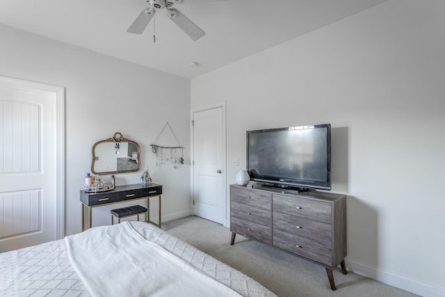 bedroom with ceiling fan and light colored carpet