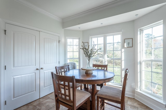 dining area featuring ornamental molding