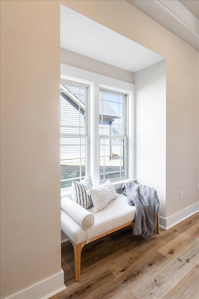 living area with light hardwood / wood-style floors