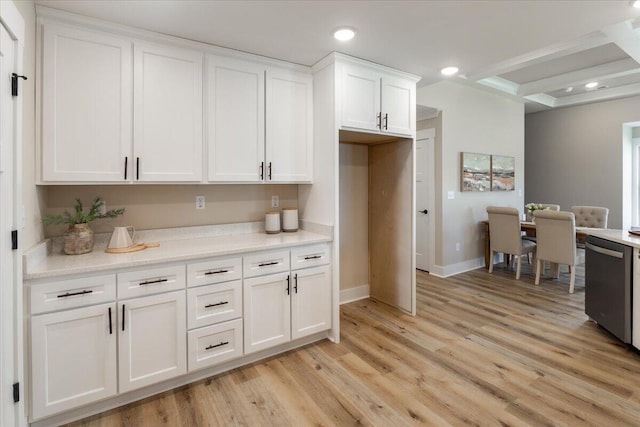 kitchen featuring white cabinetry, light hardwood / wood-style flooring, and dishwasher