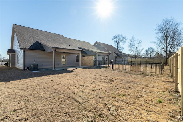 back of property featuring a patio and cooling unit