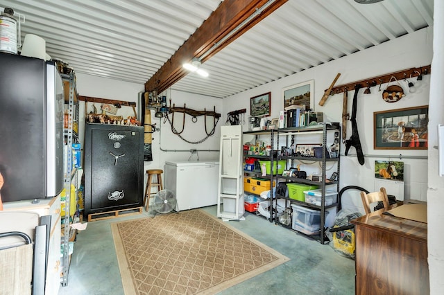 interior space with fridge and covered porch