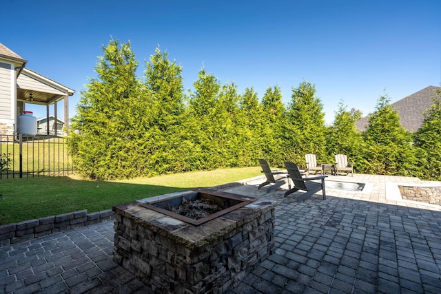 view of patio / terrace with a fire pit