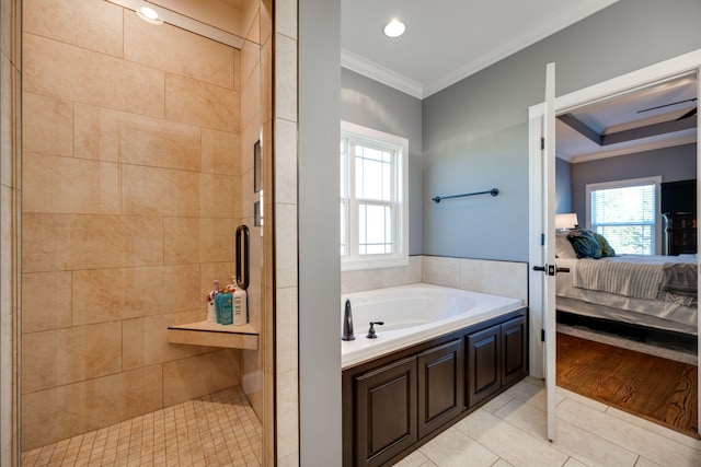 bathroom with crown molding, shower with separate bathtub, and hardwood / wood-style flooring