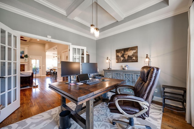 home office with beam ceiling, french doors, wood-type flooring, and ornamental molding