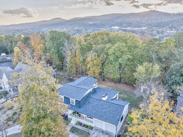 aerial view at dusk with a mountain view