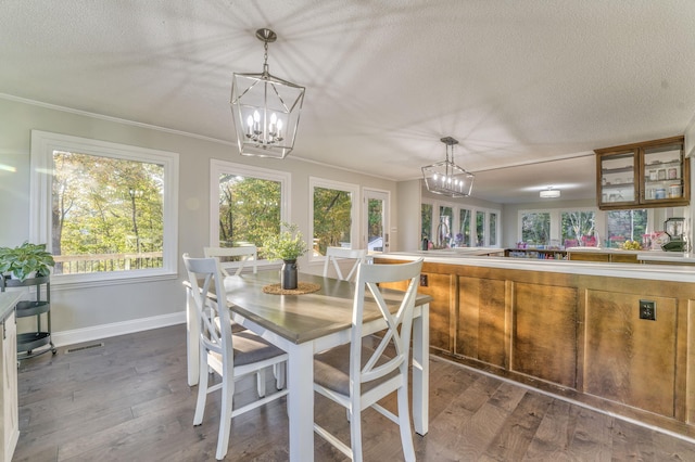 sunroom with a notable chandelier