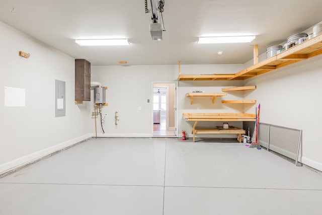 garage with electric panel, a garage door opener, and water heater