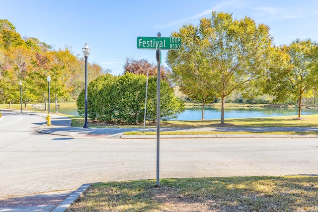 view of street with a water view