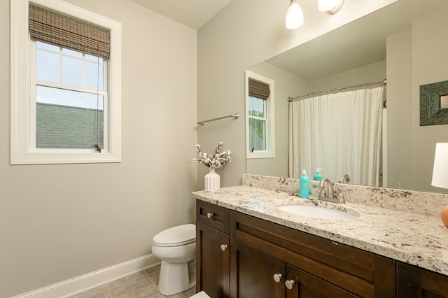 8556 Festival Loop, Chattanooga, TN 37419 - bathroom with baseboards, toilet, tile patterned flooring, vanity, and a shower with curtain