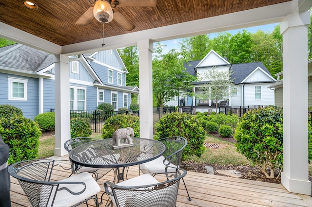 8556 Festival Loop, Chattanooga, TN 37419 - wooden deck with outdoor dining area and ceiling fan