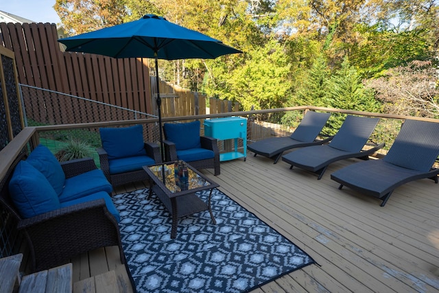 wooden deck with outdoor lounge area