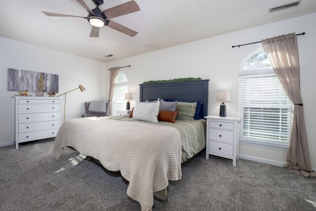 bedroom featuring ceiling fan and carpet floors