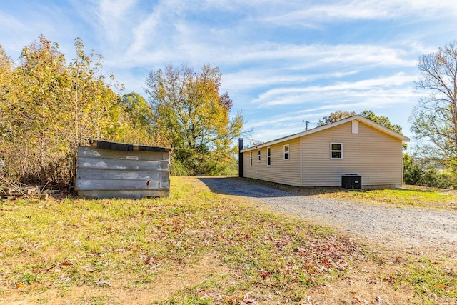 view of home's exterior with central AC unit