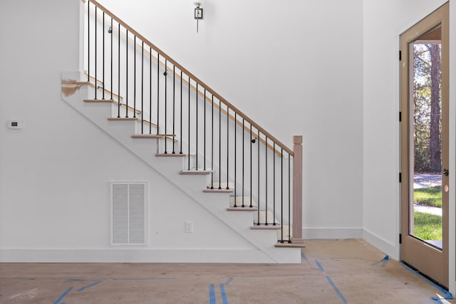 foyer entrance with a wealth of natural light