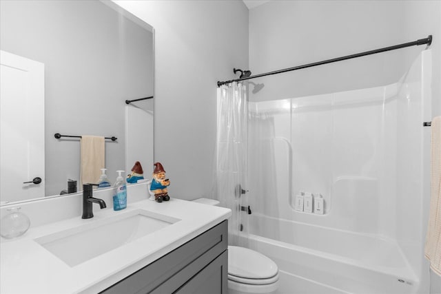 full bathroom featuring vanity, toilet, and shower / bathtub combination with curtain