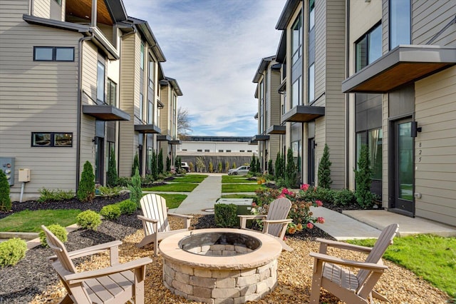 view of patio with an outdoor fire pit