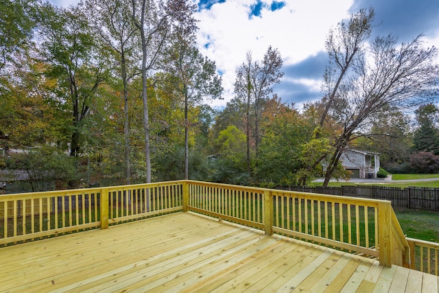 wooden deck with a yard