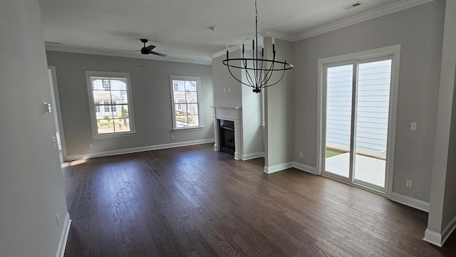 unfurnished living room featuring ceiling fan with notable chandelier, dark hardwood / wood-style floors, and crown molding