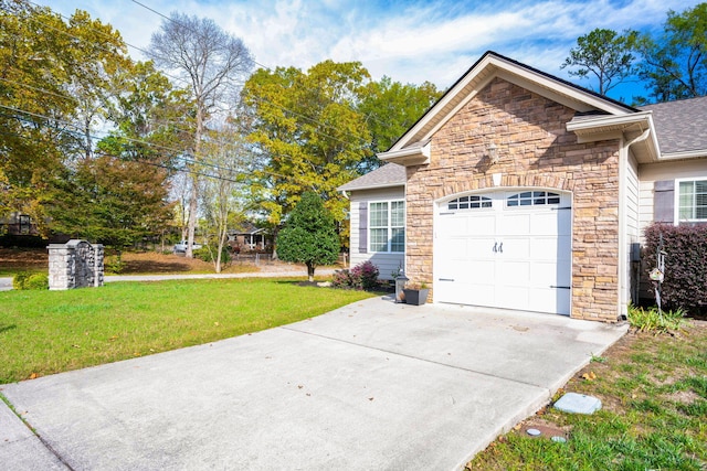 view of side of home featuring a garage and a lawn