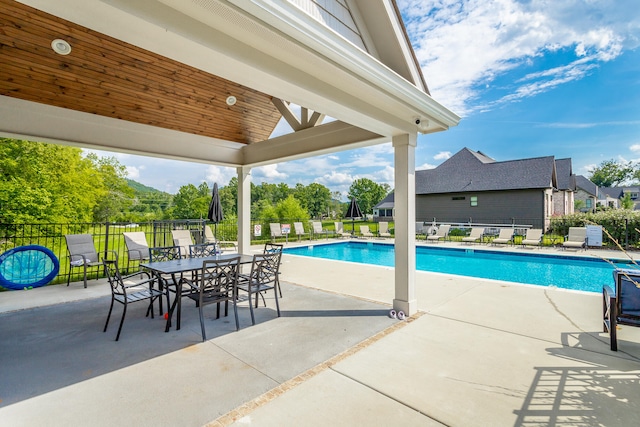 view of pool with a patio