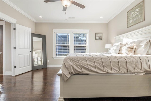 bedroom featuring ornamental molding, ceiling fan, and dark wood-type flooring