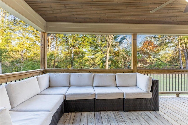 deck featuring outdoor lounge area